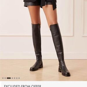 Stuart Weitzman 50/50 Black Leather Knee-High Boots. Never worn. Still in box